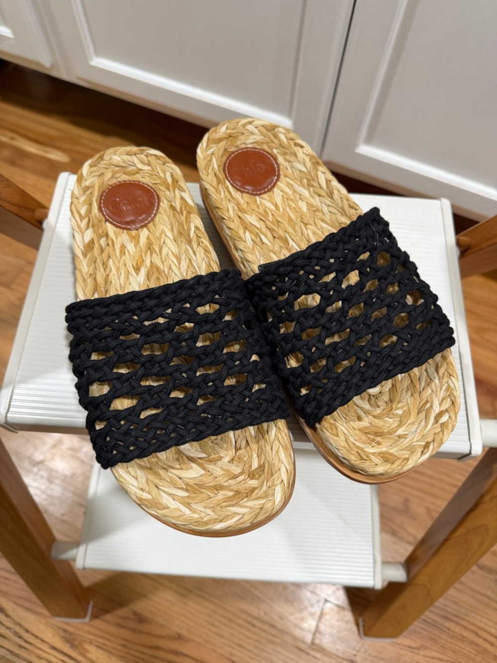 Chloe Woven Raffia Strap Slide Sandals in Black